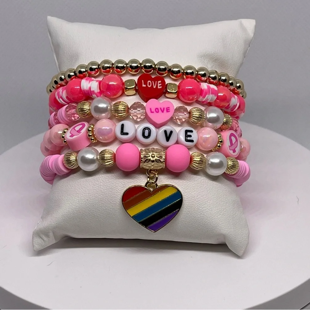 NWT! Fashion Jewelry 5 pink and gold beaded stackable stretch bracelets